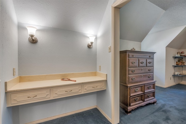 6555 Dartbrook Dr, Dallas, TX 75254 - bathroom with lofted ceiling and baseboards