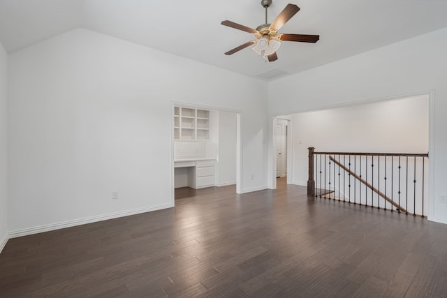 additional living space featuring dark wood-style flooring, ceiling fan, visible vents, baseboards, and vaulted ceiling