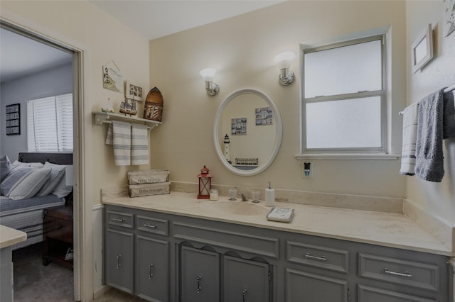 bathroom featuring connected bathroom and vanity