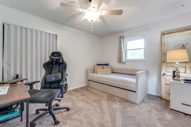 bedroom featuring carpet floors, baseboards, and ceiling fan