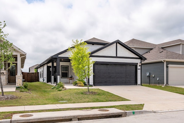 2021 Pine Stone Ln, Forney, TX 75126 - view of front facade with an attached garage, fence, a front yard, and concrete driveway