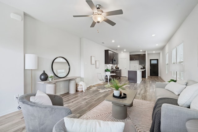 2021 Pine Stone Ln, Forney, TX 75126 - living area with baseboards, a ceiling fan, recessed lighting, and light wood-style flooring