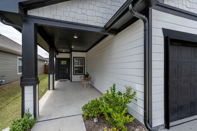 2021 Pine Stone Ln, Forney, TX 75126 - property entrance with covered porch and a garage