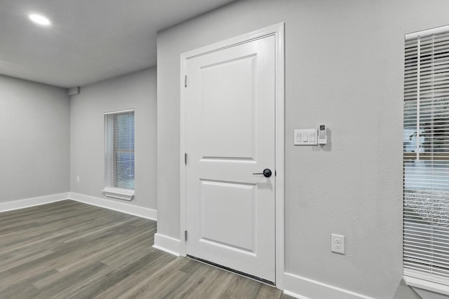 217 N Hawkins St, Waxahachie, TX 75165 - interior space with baseboards and wood finished floors
