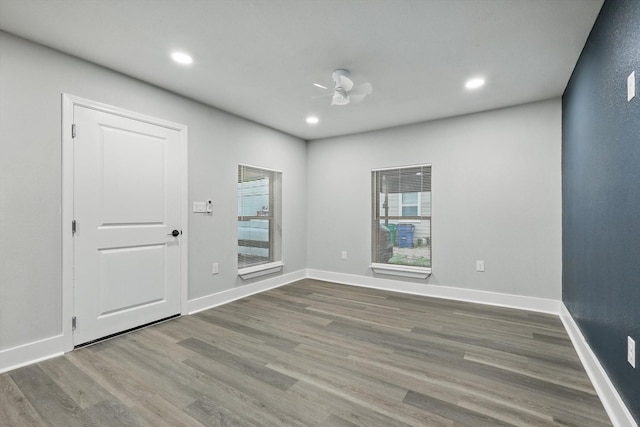 217 N Hawkins St, Waxahachie, TX 75165 - unfurnished room with plenty of natural light, a ceiling fan, recessed lighting, and wood finished floors