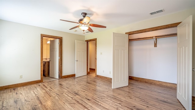 630 N Park St, Dublin, TX 76446 - unfurnished bedroom with light wood-style flooring, baseboards, a closet, ceiling fan, and ensuite bathroom