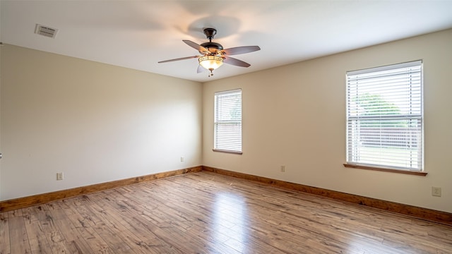 630 N Park St, Dublin, TX 76446 - empty room featuring ceiling fan, wood-type flooring, and baseboards