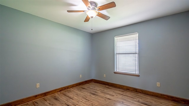 630 N Park St, Dublin, TX 76446 - empty room with baseboards, light wood-style flooring, and a ceiling fan