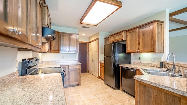 630 N Park St, Dublin, TX 76446 - kitchen featuring a sink, black appliances, exhaust hood, light countertops, and brown cabinetry