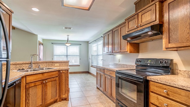 630 N Park St, Dublin, TX 76446 - kitchen with black / electric stove, a sink, under cabinet range hood, brown cabinetry, and dishwasher
