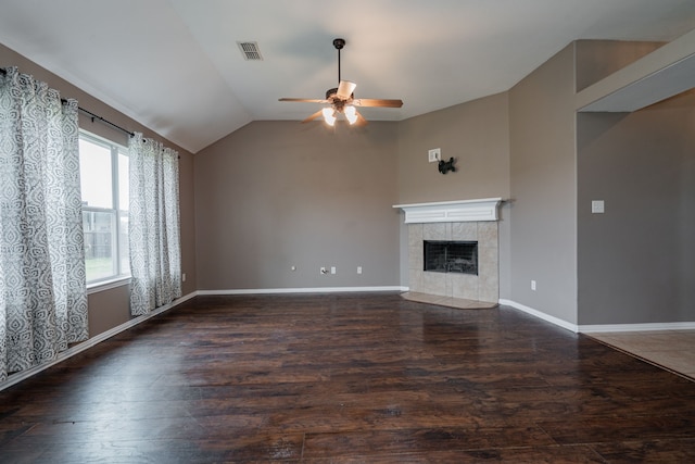unfurnished living room with ceiling fan, visible vents, wood finished floors, and lofted ceiling