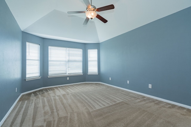 empty room featuring baseboards, carpet, and a ceiling fan