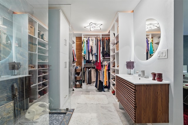 5243 Welden Ct, Fort Worth, TX 76132 - walk in closet featuring marble finish floor