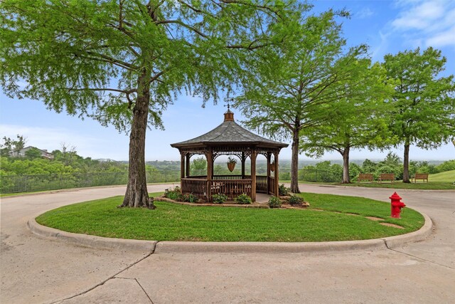 5243 Welden Ct, Fort Worth, TX 76132 - surrounding community featuring curved driveway, fence, a yard, and a gazebo