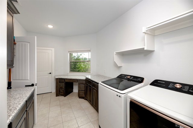 235 Winchester St, Van Alstyne, TX 75495 - washroom with cabinet space, light tile patterned floors, visible vents, and washer and clothes dryer