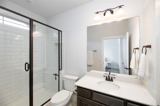 235 Winchester St, Van Alstyne, TX 75495 - ensuite bathroom featuring vanity, a stall shower, toilet, and connected bathroom