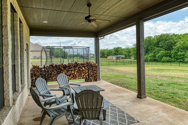 235 Winchester St, Van Alstyne, TX 75495 - view of patio / terrace with a ceiling fan and a fenced backyard