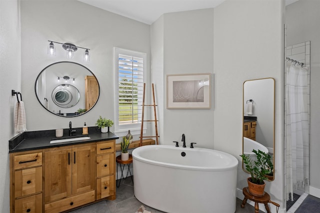 full bath featuring a shower with shower curtain, a soaking tub, tile patterned flooring, and vanity