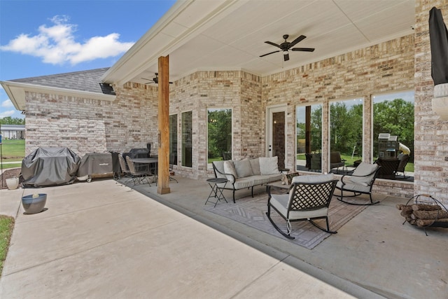view of patio / terrace with a ceiling fan, outdoor lounge area, and outdoor dining space