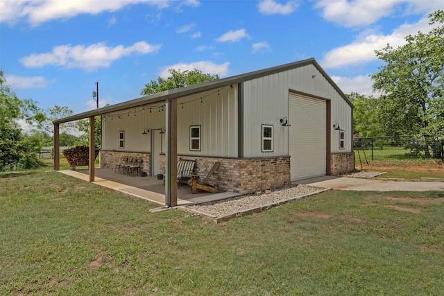 exterior space with fence and an outbuilding