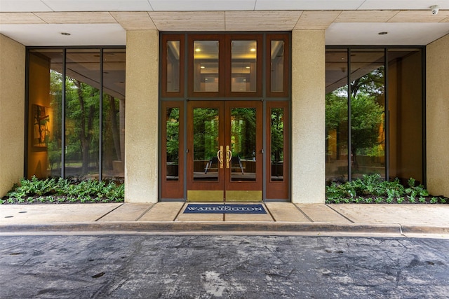 3831 Turtle Creek Blvd Unit 7E, Dallas, TX 75219 - entrance to property with stucco siding and french doors