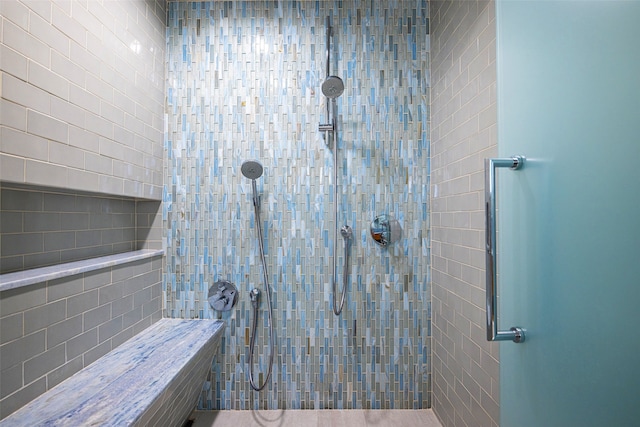 3831 Turtle Creek Blvd Unit 7E, Dallas, TX 75219 - bathroom with tiled shower