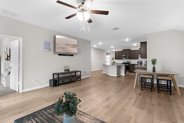4016 Glastonbury Rd, Mckinney, TX 75071 - living area featuring visible vents, a ceiling fan, light wood-style floors, and recessed lighting
