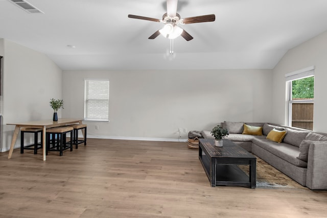 4016 Glastonbury Rd, Mckinney, TX 75071 - living room featuring a ceiling fan, visible vents, light wood-type flooring, baseboards, and lofted ceiling