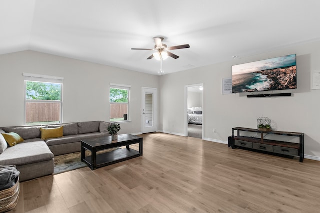 4016 Glastonbury Rd, Mckinney, TX 75071 - living area featuring baseboards, ceiling fan, vaulted ceiling, and light wood-style flooring