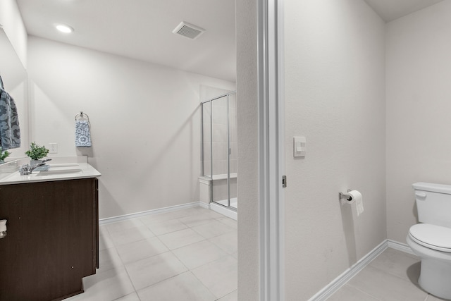 4016 Glastonbury Rd, Mckinney, TX 75071 - full bathroom with visible vents, tile patterned flooring, vanity, toilet, and a shower stall