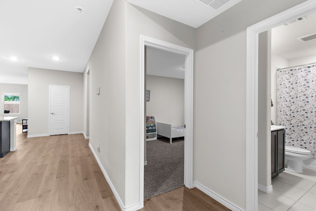 4016 Glastonbury Rd, Mckinney, TX 75071 - corridor with recessed lighting, baseboards, light wood finished floors, and visible vents
