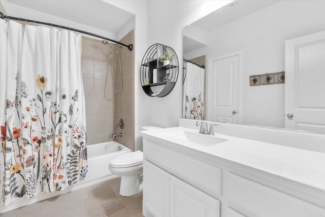 full bathroom with vanity, toilet, and shower / tub combo
