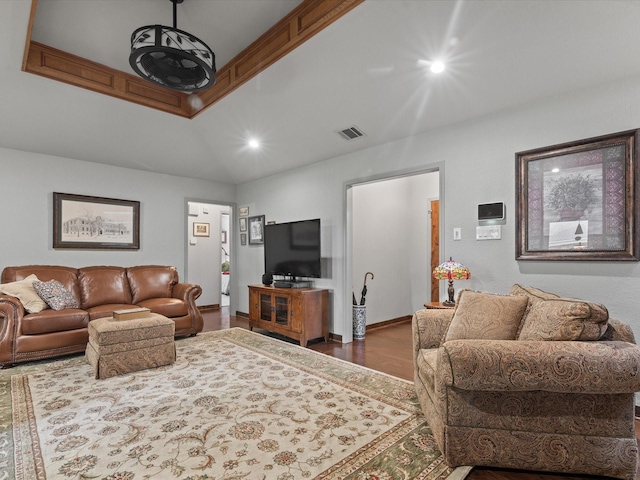 living area featuring recessed lighting, wood finished floors, and visible vents
