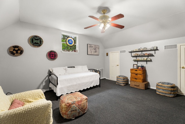 bedroom with visible vents, a ceiling fan, dark carpet, and vaulted ceiling
