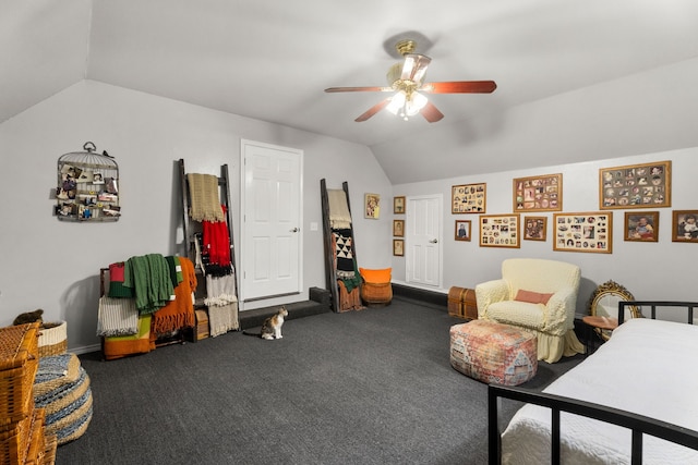 interior space with carpet floors, a ceiling fan, and vaulted ceiling