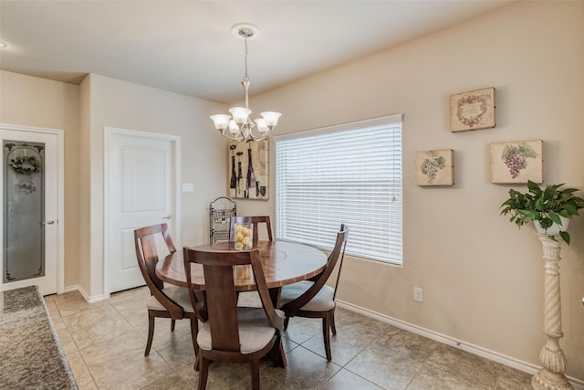 dining space featuring baseboards, light tile patterned flooring, and a notable chandelier