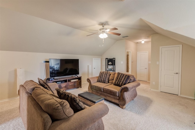 living area featuring a ceiling fan, visible vents, vaulted ceiling, baseboards, and light carpet