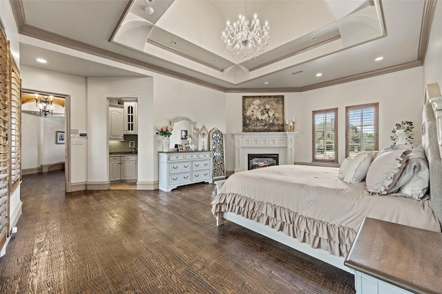 1237 Wales Dr, Mclendon Chisholm, TX 75032 - bedroom featuring a chandelier, a tray ceiling, crown molding, a lit fireplace, and recessed lighting