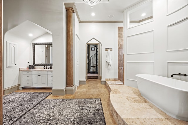 1237 Wales Dr, Mclendon Chisholm, TX 75032 - bathroom with crown molding, vanity, a freestanding bath, decorative columns, and walk in shower