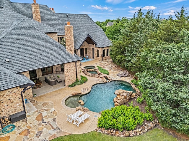 1237 Wales Dr, Mclendon Chisholm, TX 75032 - outdoor pool featuring an in-ground hot tub and a patio