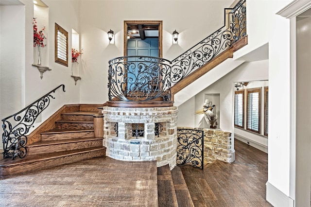 1237 Wales Dr, Mclendon Chisholm, TX 75032 - staircase featuring plenty of natural light, a towering ceiling, and wood finished floors