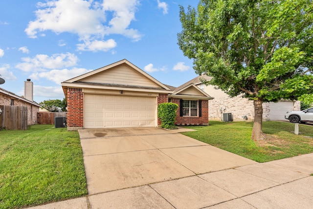 ranch-style house with fence, a front lawn, and brick siding