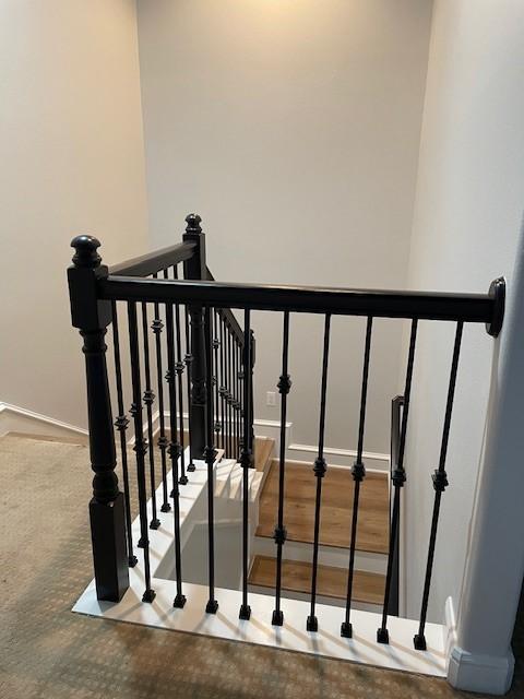 stairway with baseboards