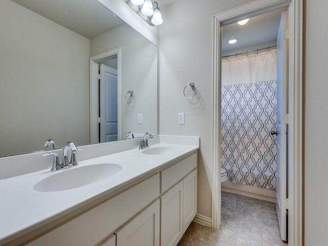 5517 Grove Cove Dr, Mckinney, TX 75071 - bathroom with a sink, tile patterned floors, toilet, and double vanity
