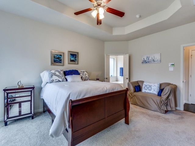 5517 Grove Cove Dr, Mckinney, TX 75071 - carpeted bedroom with baseboards, ceiling fan, and a raised ceiling