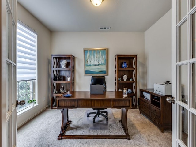 5517 Grove Cove Dr, Mckinney, TX 75071 - home office with visible vents, french doors, and light colored carpet