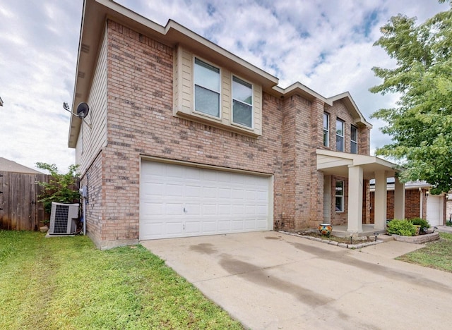 view of front facade featuring a garage and brick siding