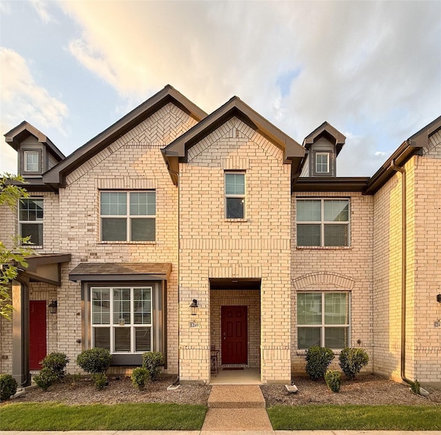 view of front of property with brick siding