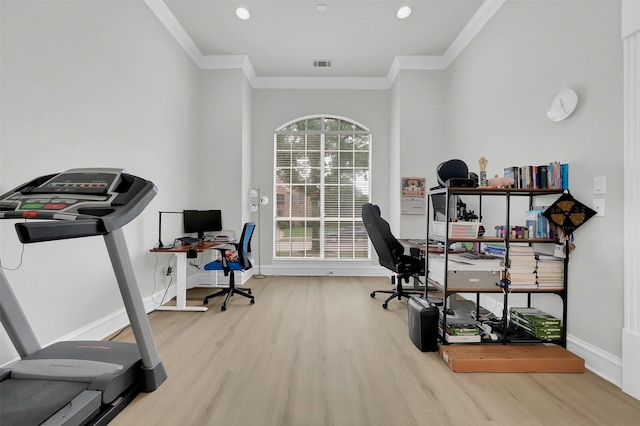office with wood finished floors, ornamental molding, baseboards, and recessed lighting