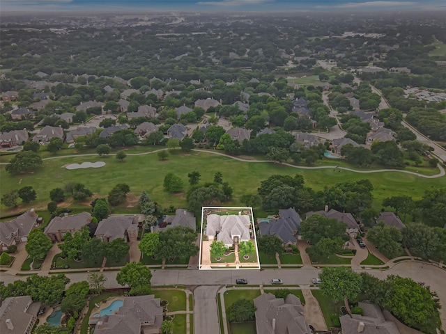 aerial perspective of suburban area with property boundaries highlighted and a golf club